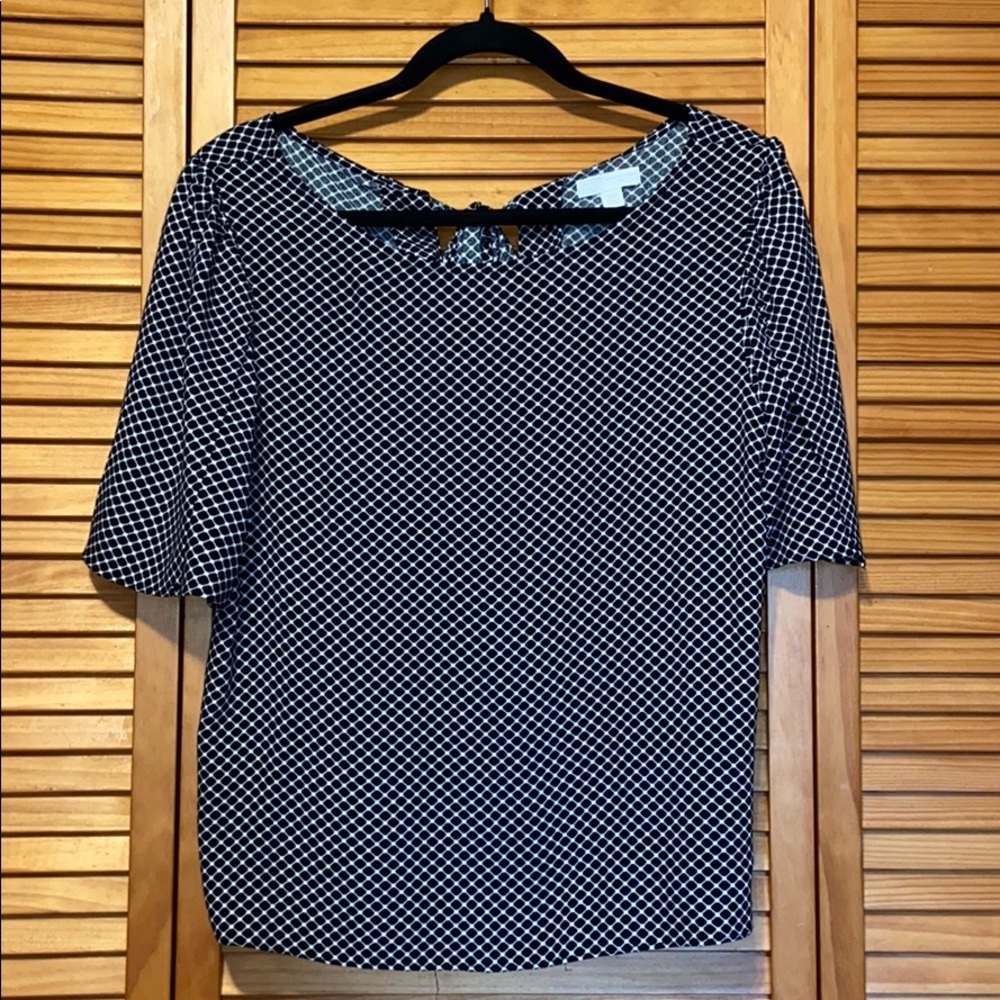 Polka dot blouse with bow tie back detailing